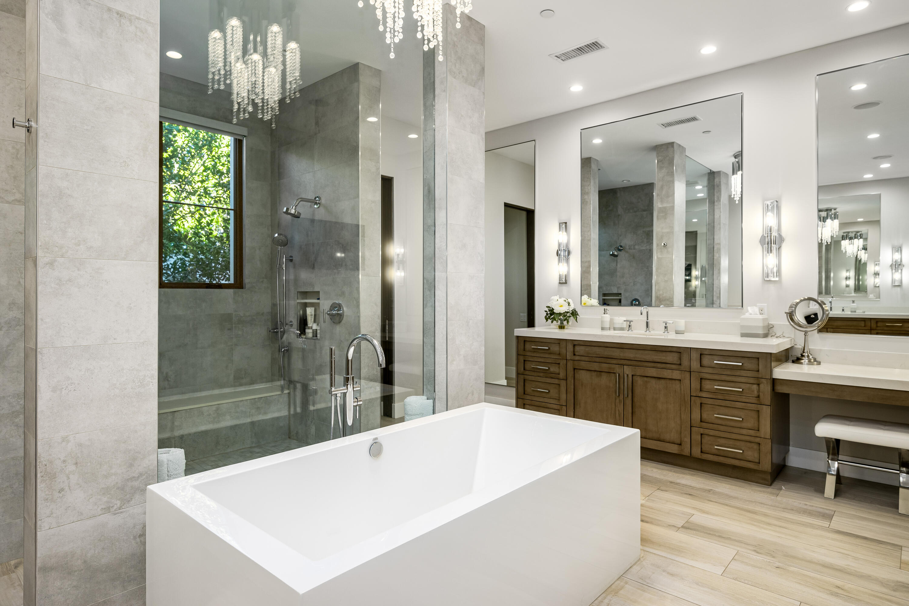 53488 Via Strada La Quinta, CA 92253 - Photo 22 of 56 a large bathroom with a sink a large mirror and a shower