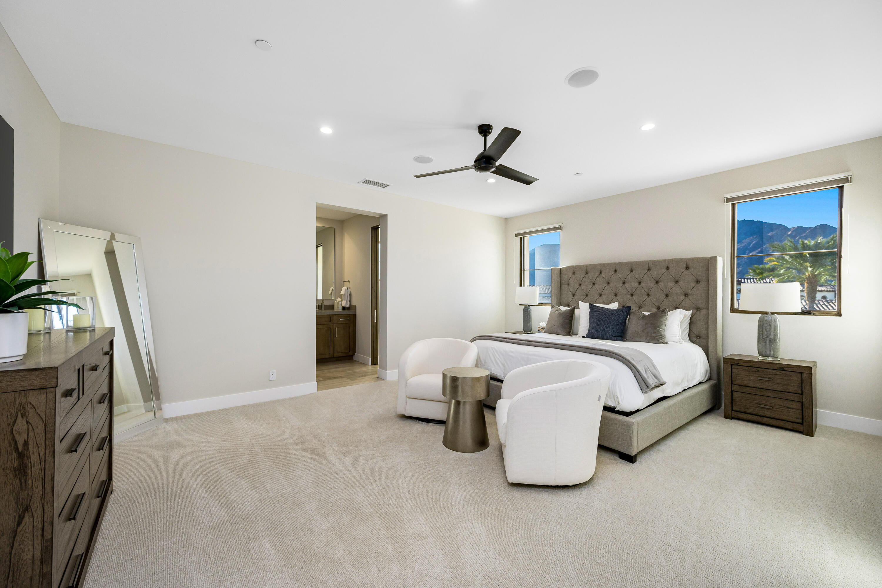 53488 Via Strada La Quinta, CA 92253 - Photo 25 of 56 a bed room with a bed and a couch