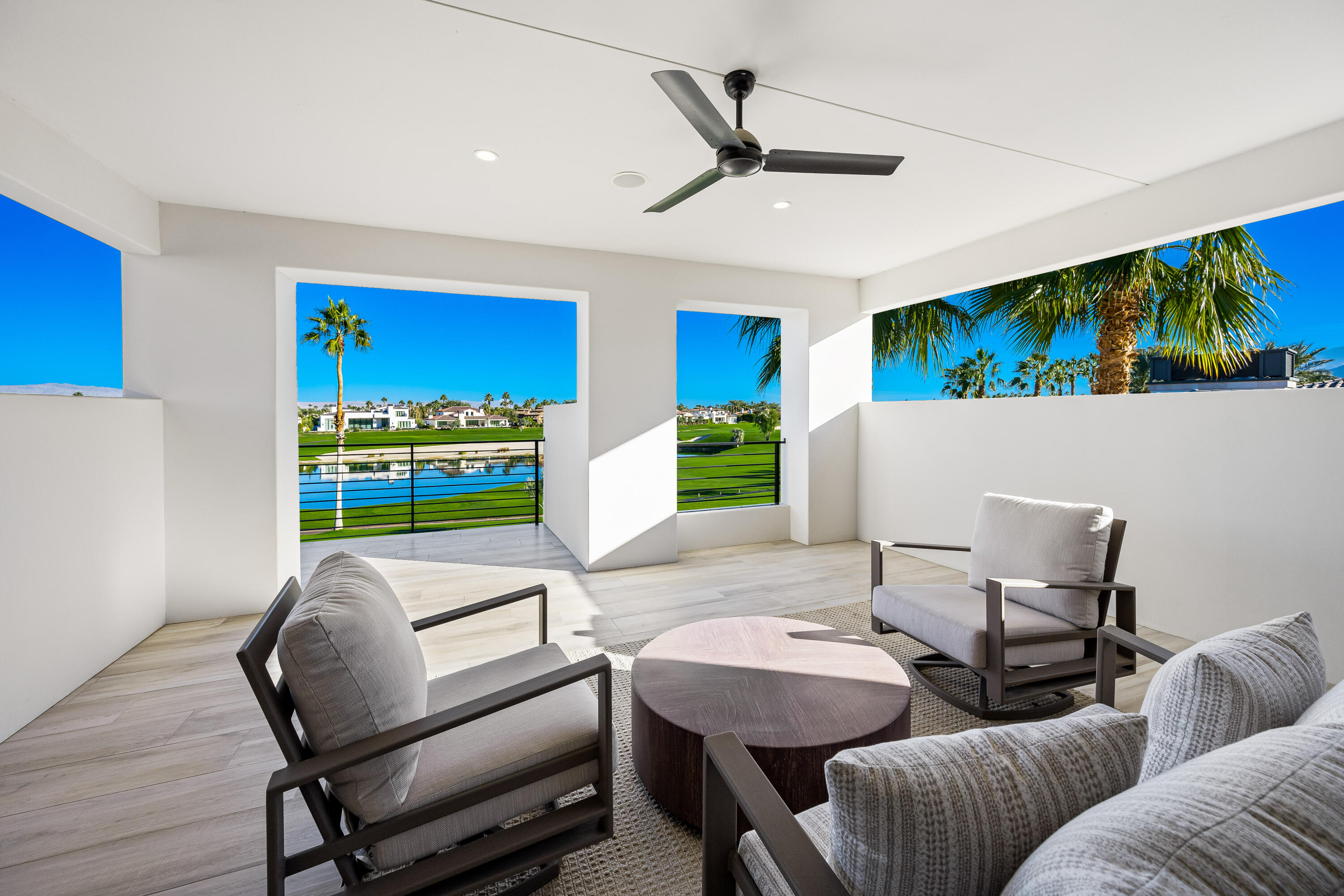 53488 Via Strada La Quinta, CA 92253 - Photo 31 of 56 a living room with furniture and a flat screen tv