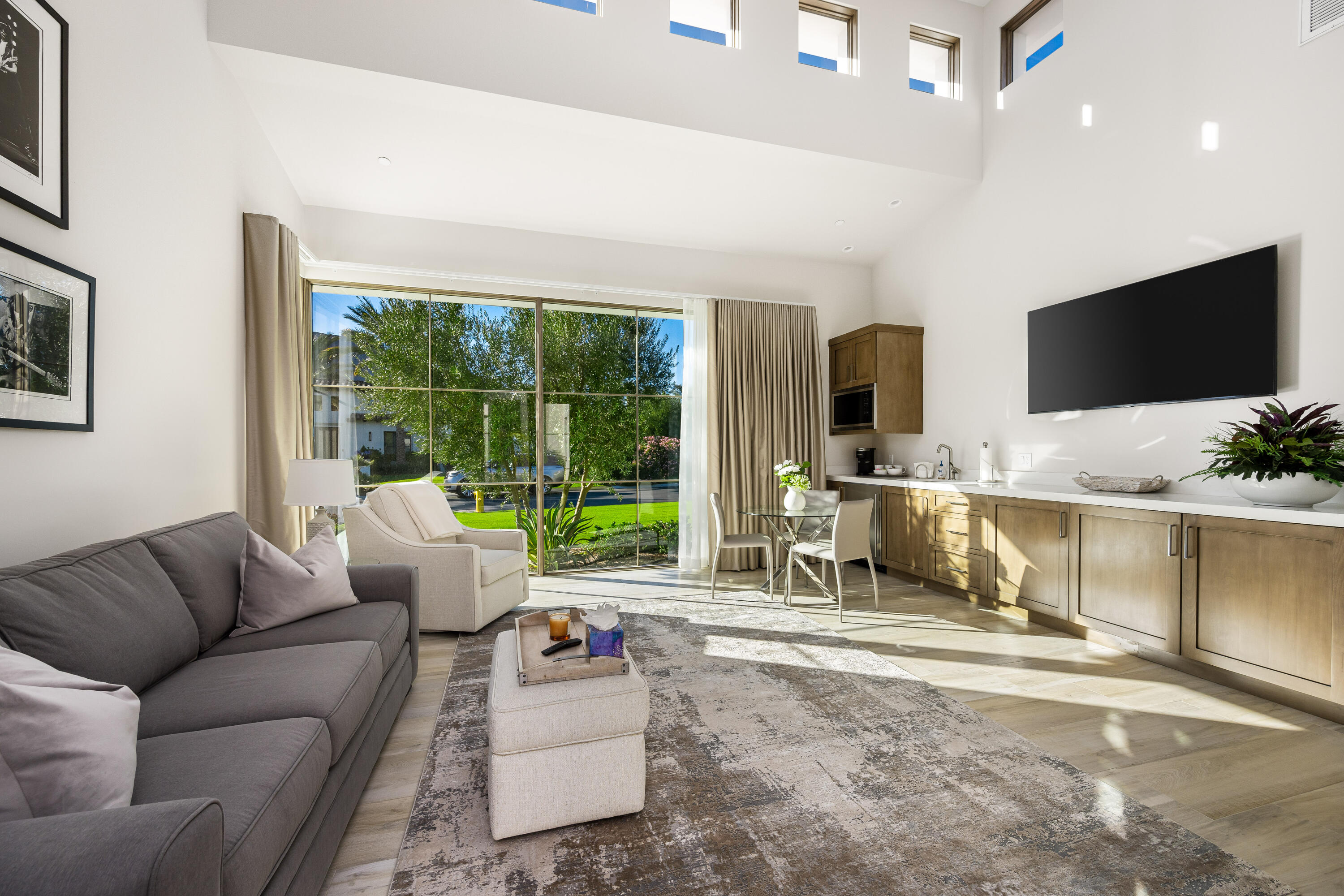 53488 Via Strada La Quinta, CA 92253 - Photo 32 of 56 a living room with furniture and a flat screen tv