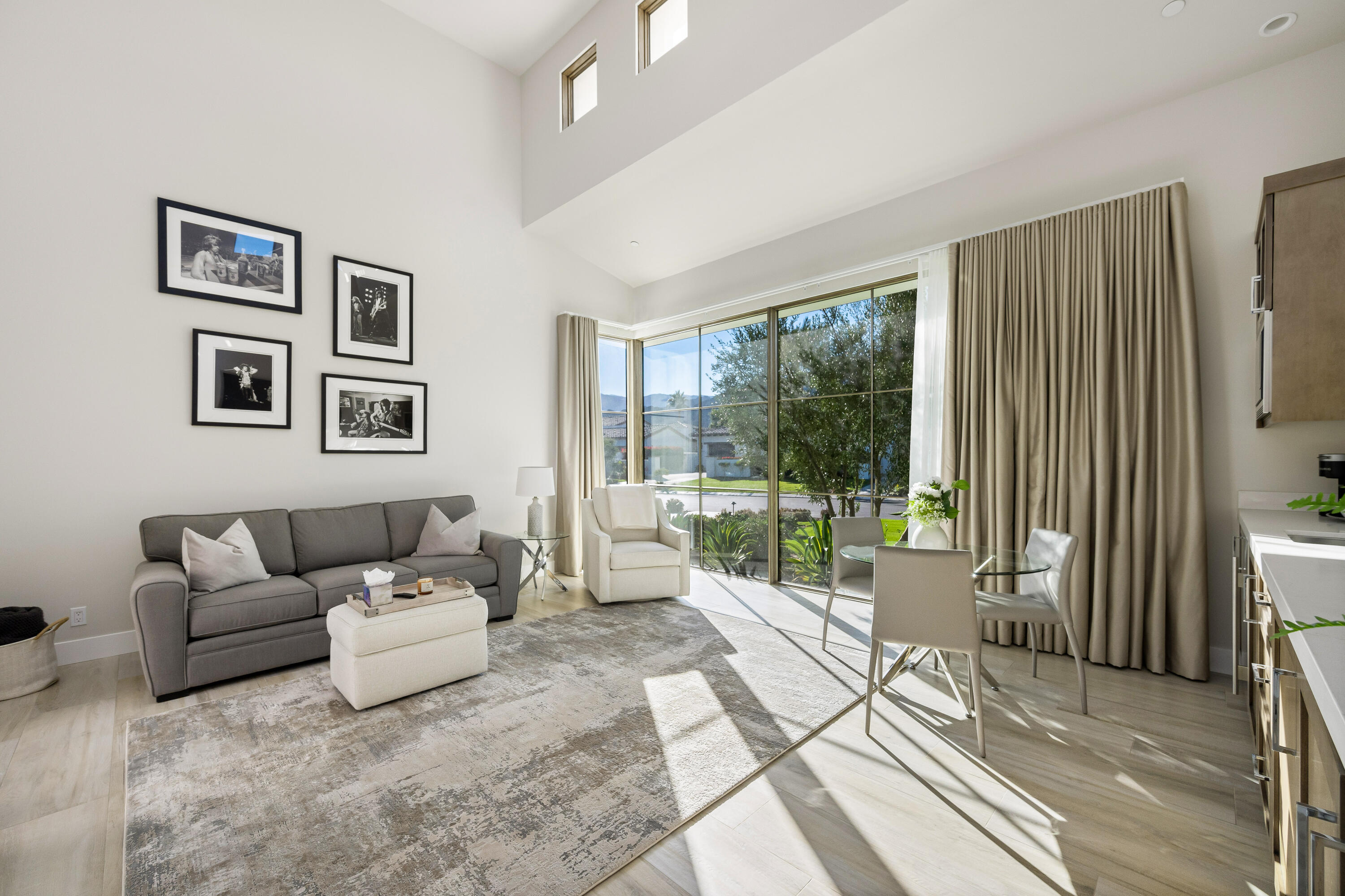 53488 Via Strada La Quinta, CA 92253 - Photo 33 of 56 a living room with furniture and a large window