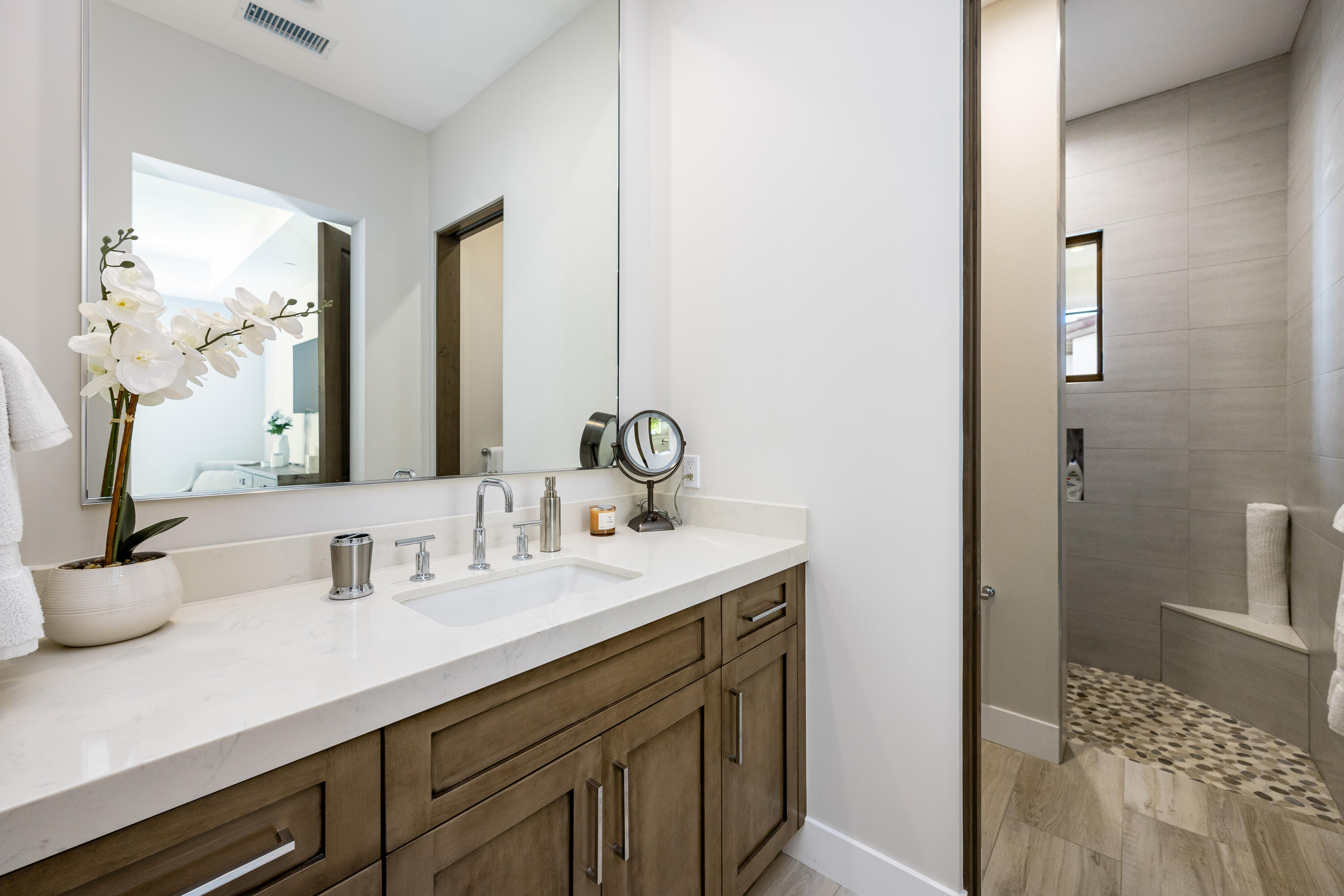 53488 Via Strada La Quinta, CA 92253 - Photo 35 of 56 a bathroom with a sink and a mirror