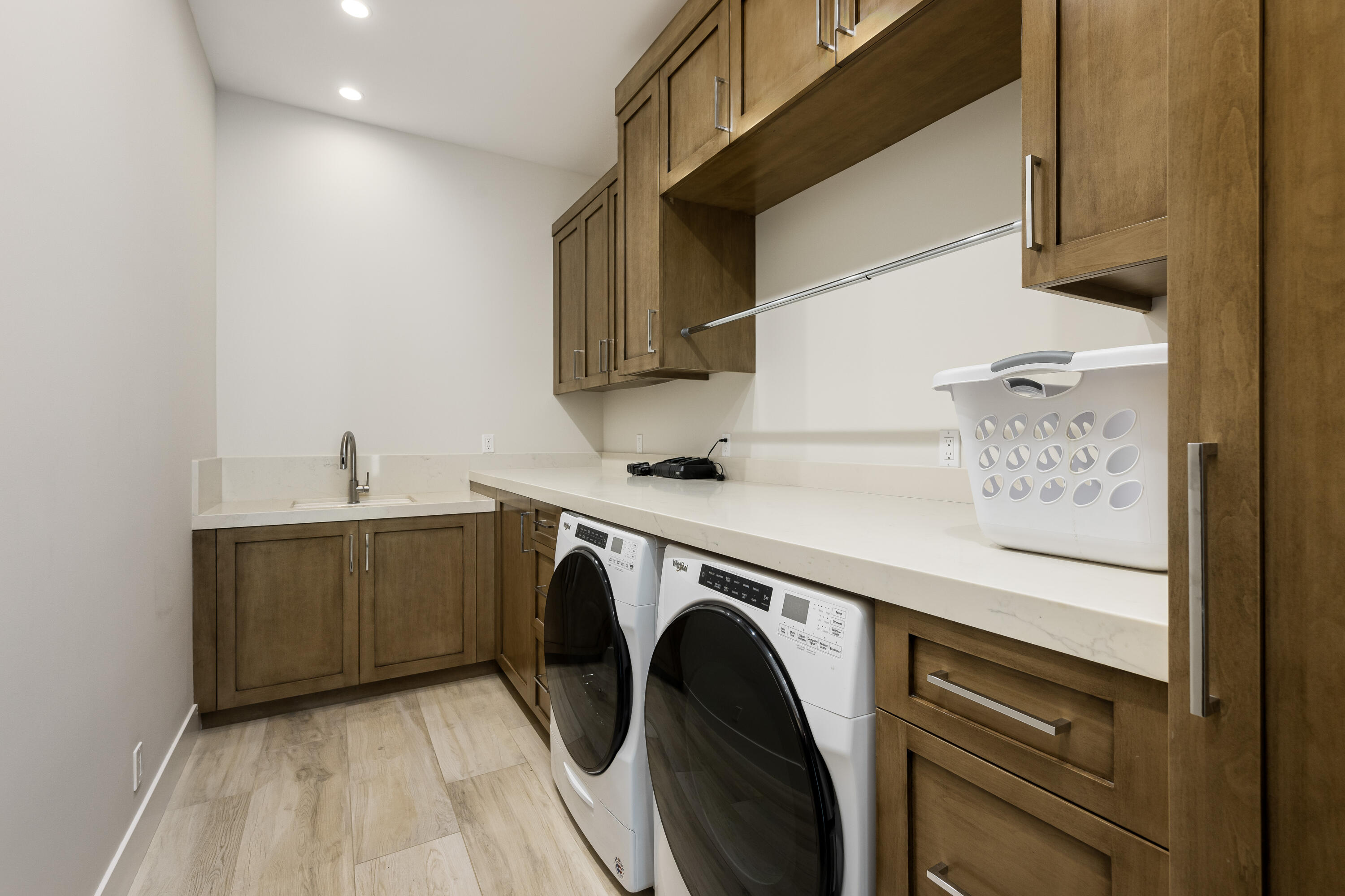 53488 Via Strada La Quinta, CA 92253 - Photo 37 of 56 a utility room with sink dryer and washer