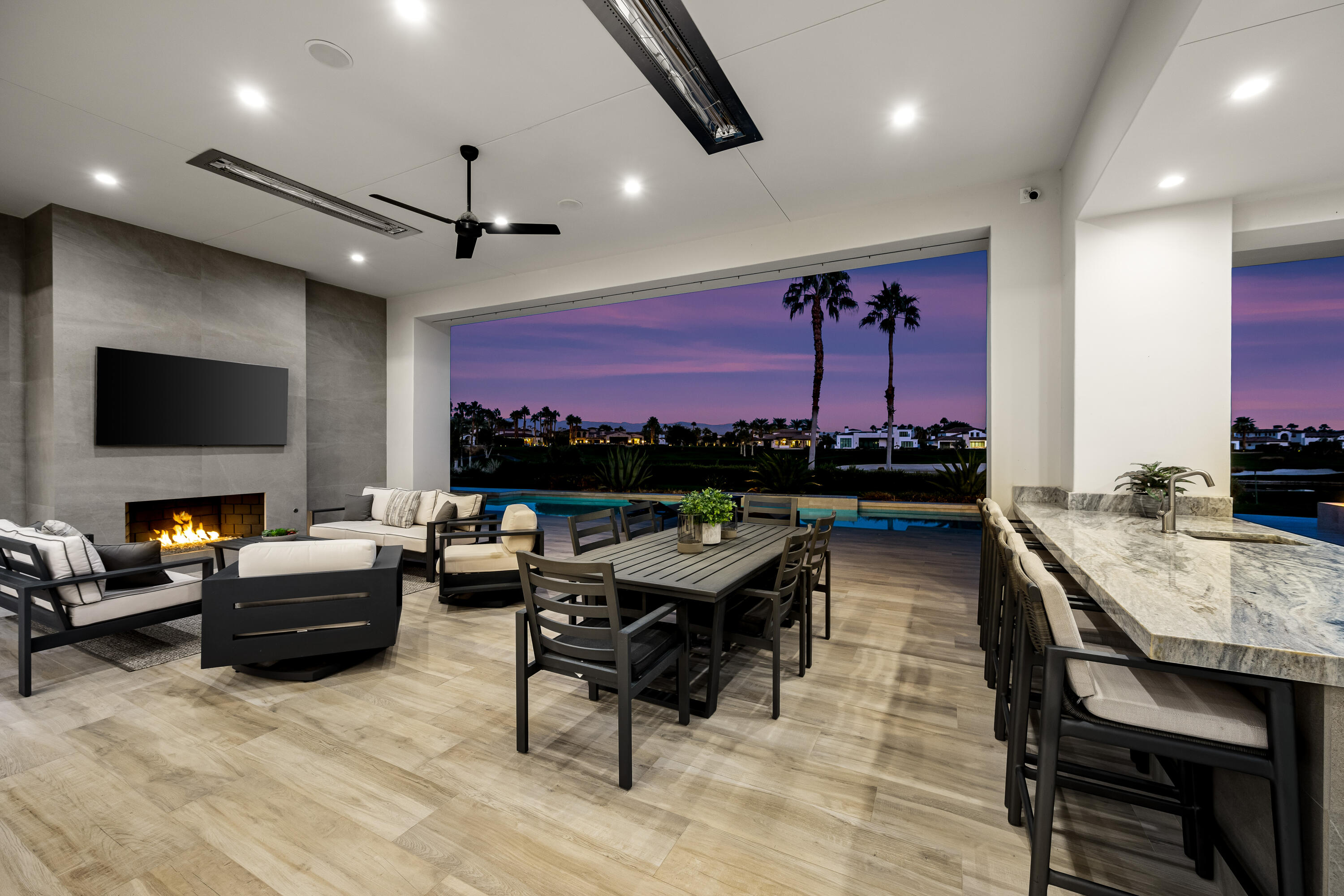 53488 Via Strada La Quinta, CA 92253 - Photo 45 of 56 a living room with furniture and a flat screen tv