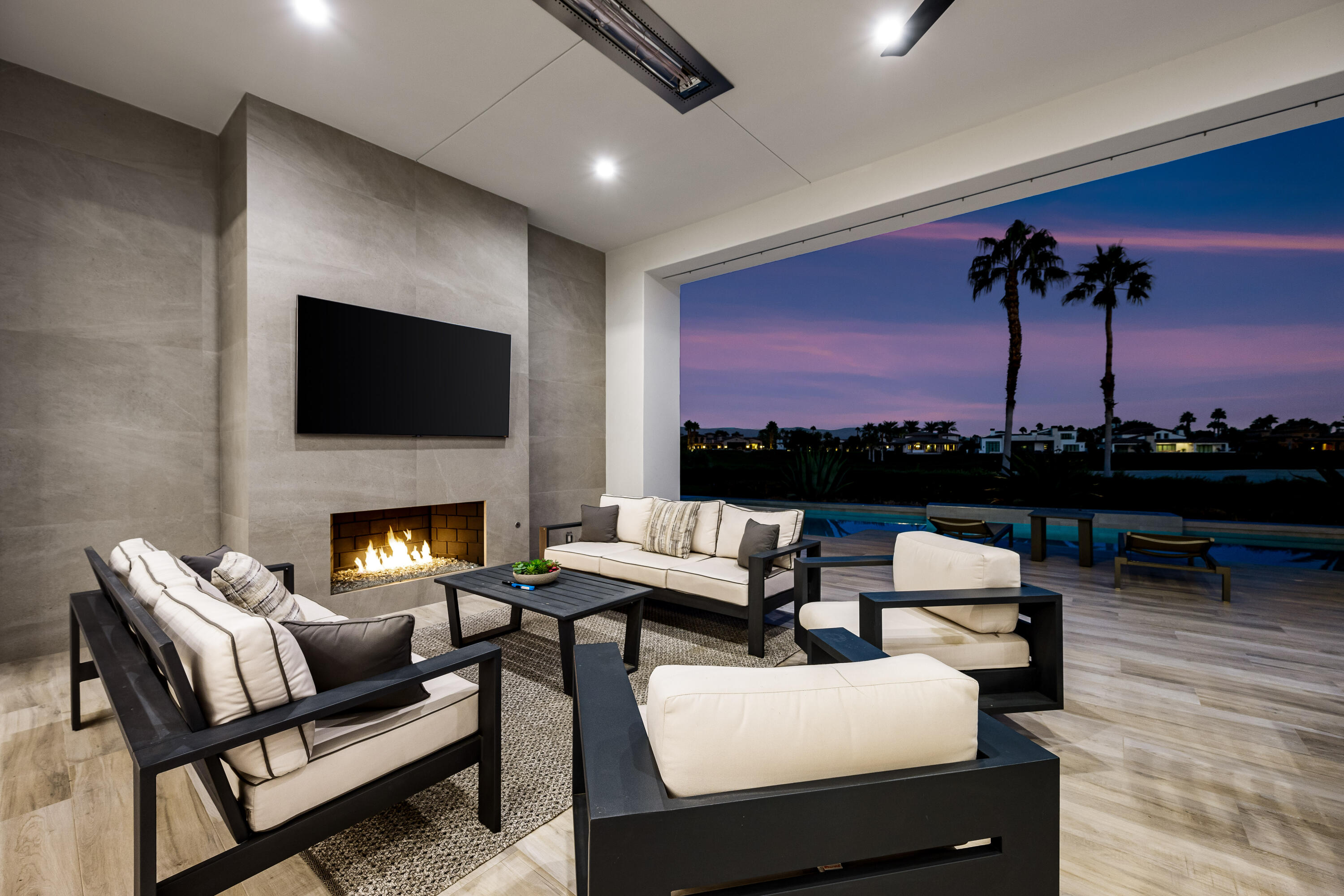 53488 Via Strada La Quinta, CA 92253 - Photo 46 of 56 a living room with furniture fireplace and a flat screen tv