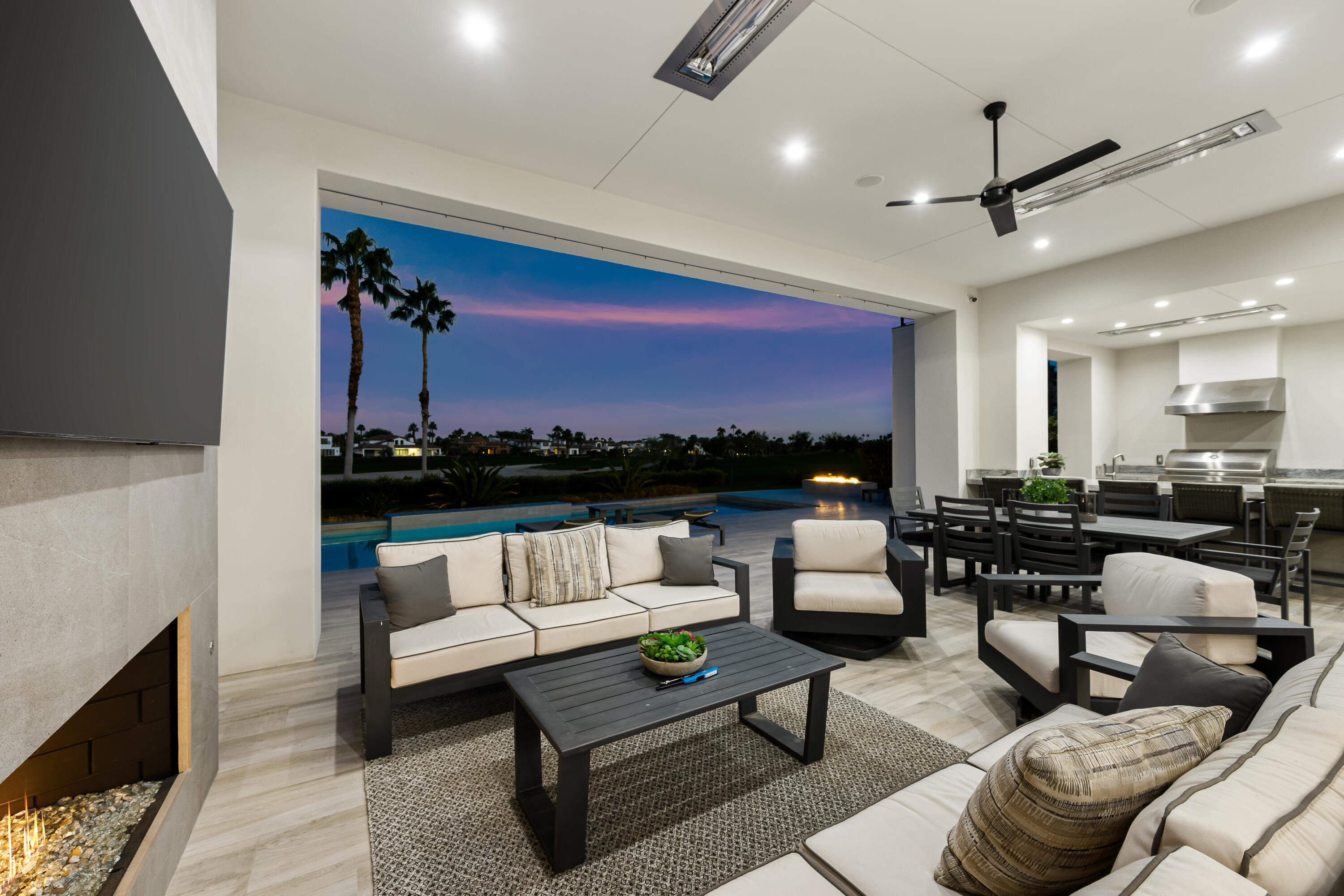 53488 Via Strada La Quinta, CA 92253 - Photo 47 of 56 a living room with furniture and a ceiling fan