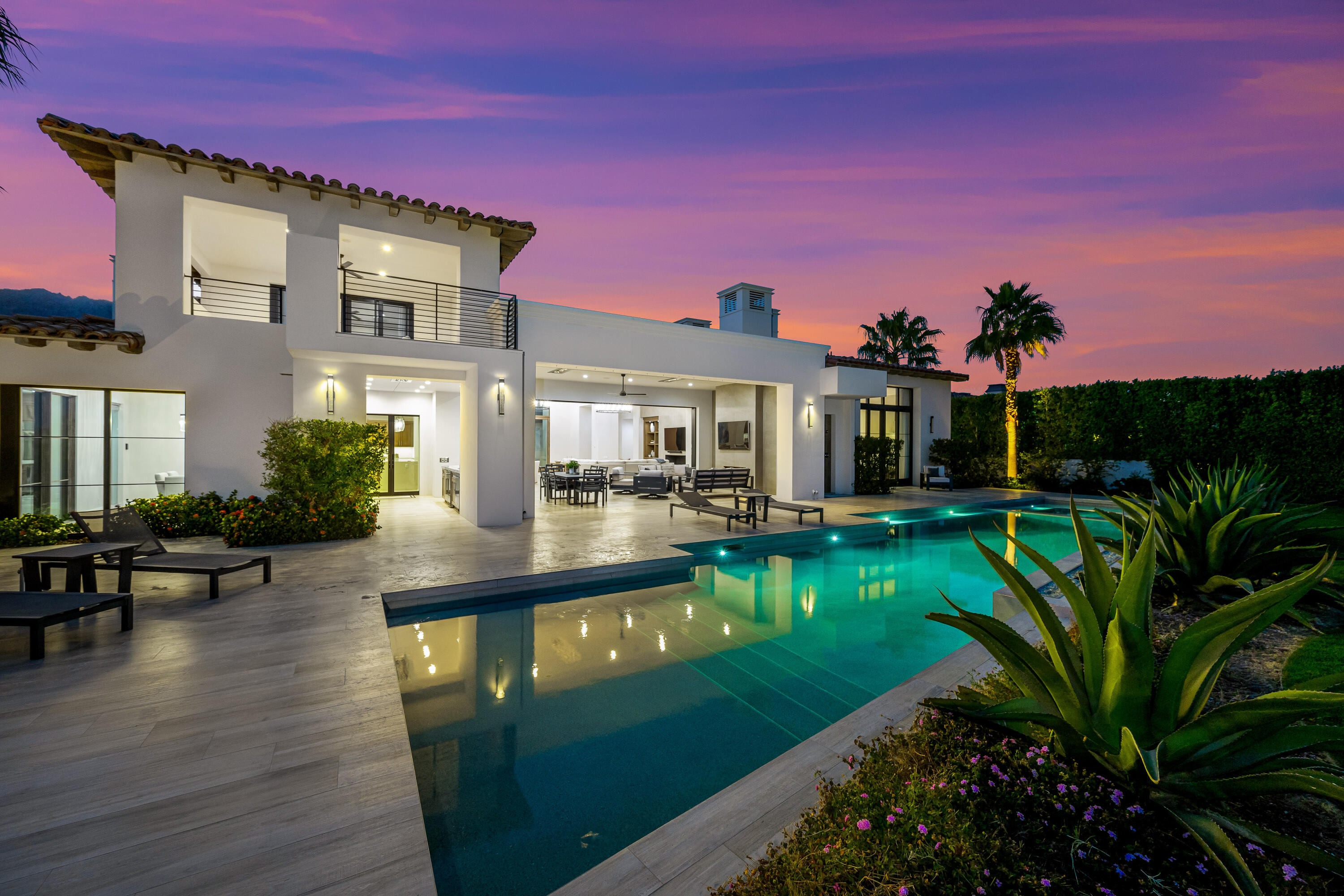 53488 Via Strada La Quinta, CA 92253 - Photo 50 of 56 a view of a house with swimming pool lawn chairs and a yard