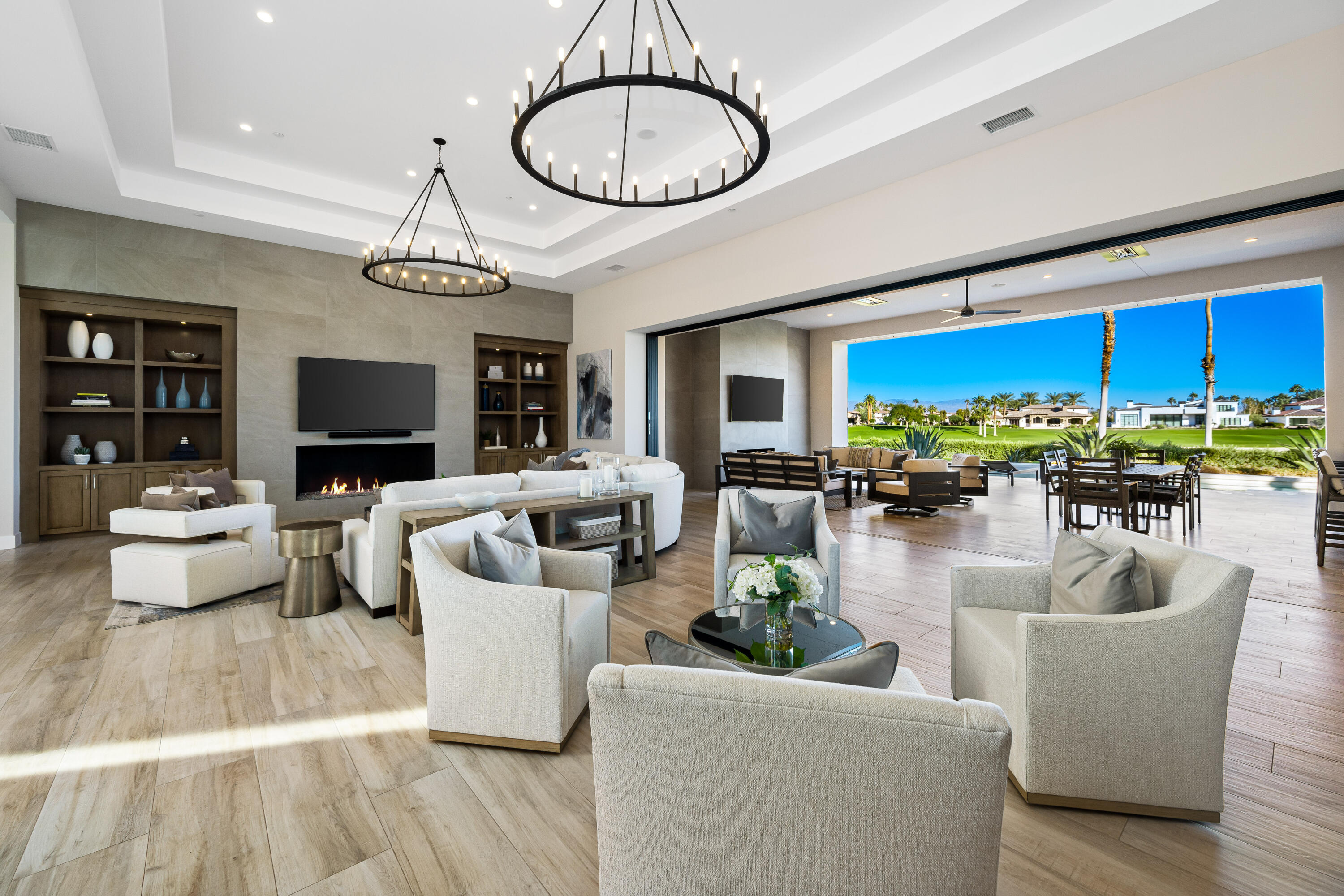 53488 Via Strada La Quinta, CA 92253 - Photo 8 of 56 a living room with fireplace furniture and a flat screen tv