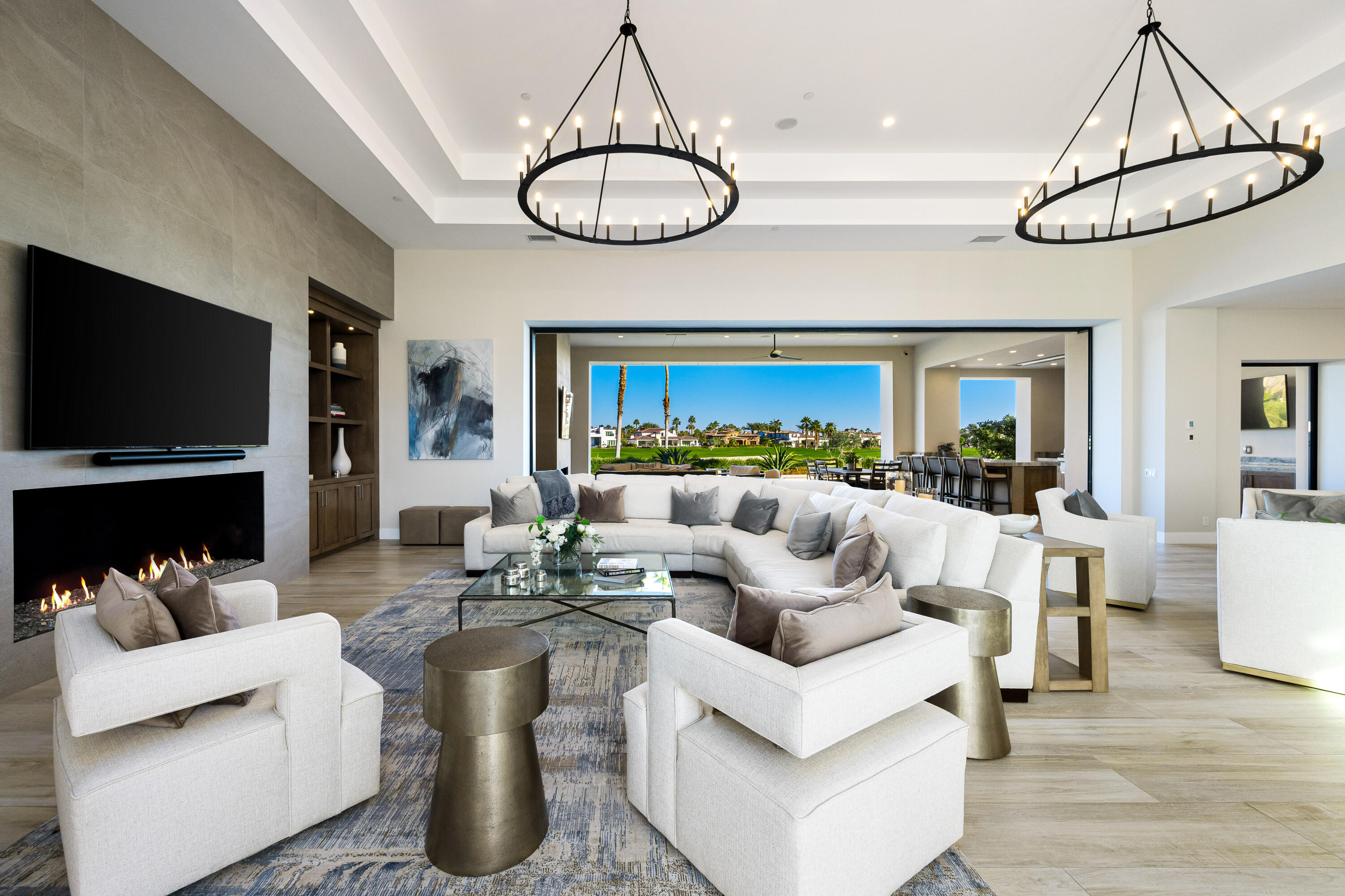 53488 Via Strada La Quinta, CA 92253 - Photo 9 of 56 a living room with patio furniture and a flat screen tv