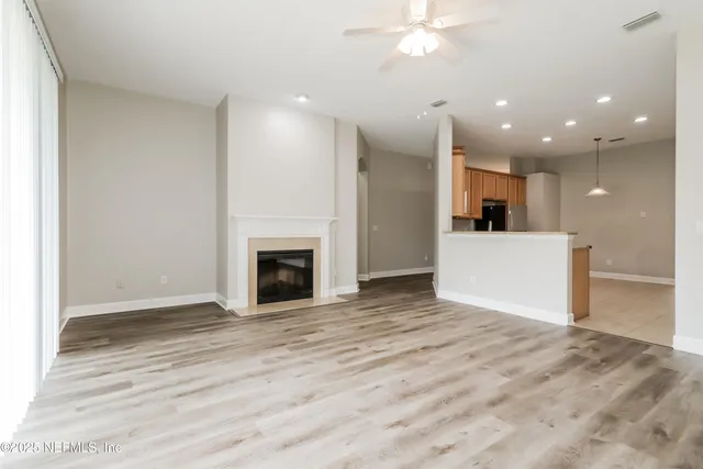 a view of a kitchen with a sink and a kitchen