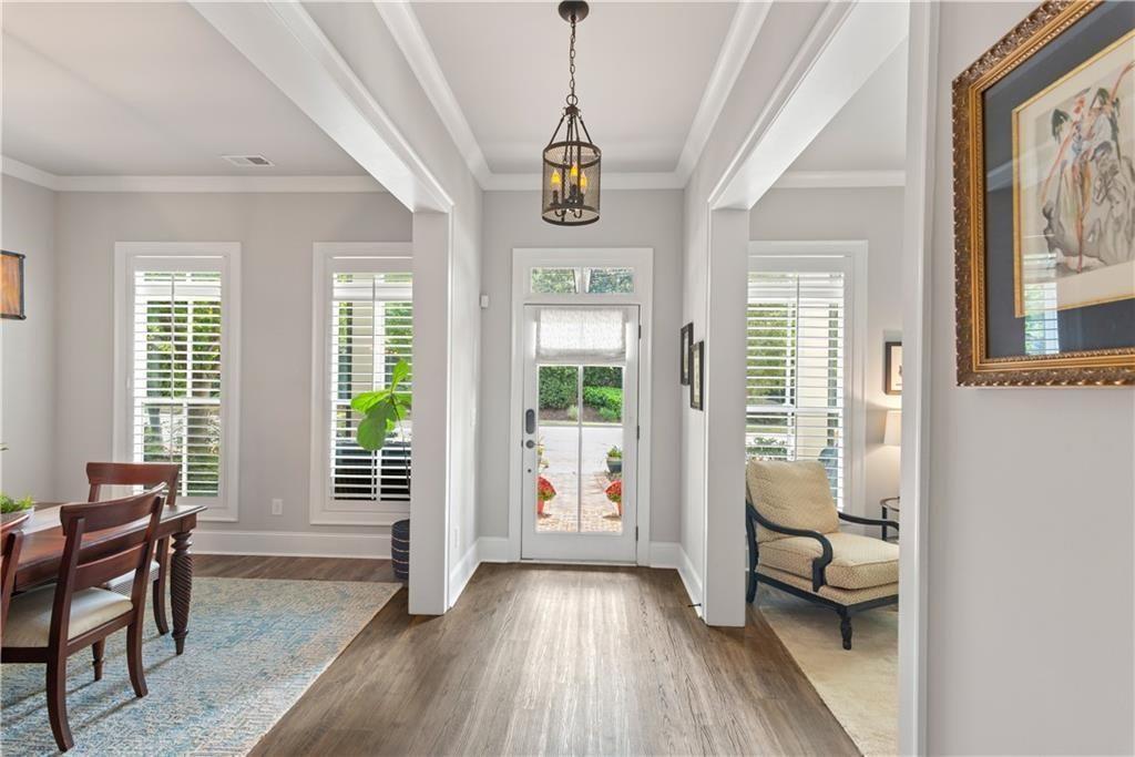 126 Academy Street Alpharetta, GA 30009 - Photo 13 of 74 a view of an entryway with wooden floor and windows