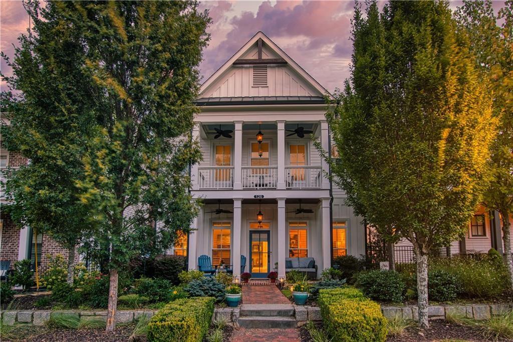 126 Academy Street Alpharetta, GA 30009 - Photo 2 of 74 a front view of a house with garden