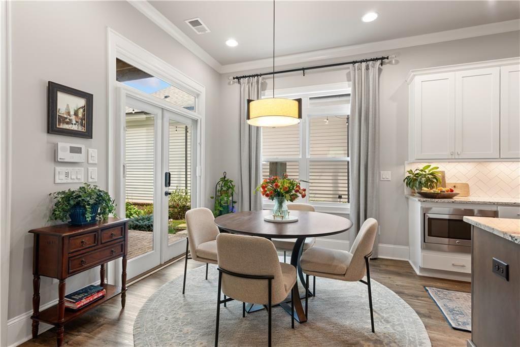 126 Academy Street Alpharetta, GA 30009 - Photo 28 of 74 a view of a dining room with furniture and window