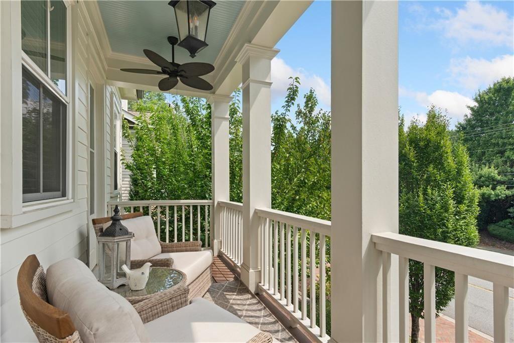 126 Academy Street Alpharetta, GA 30009 - Photo 47 of 74 a view of a chair and table in the balcony
