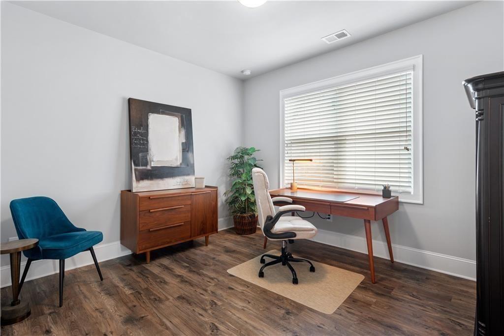 126 Academy Street Alpharetta, GA 30009 - Photo 52 of 74 a view of a workspace with furniture and a window