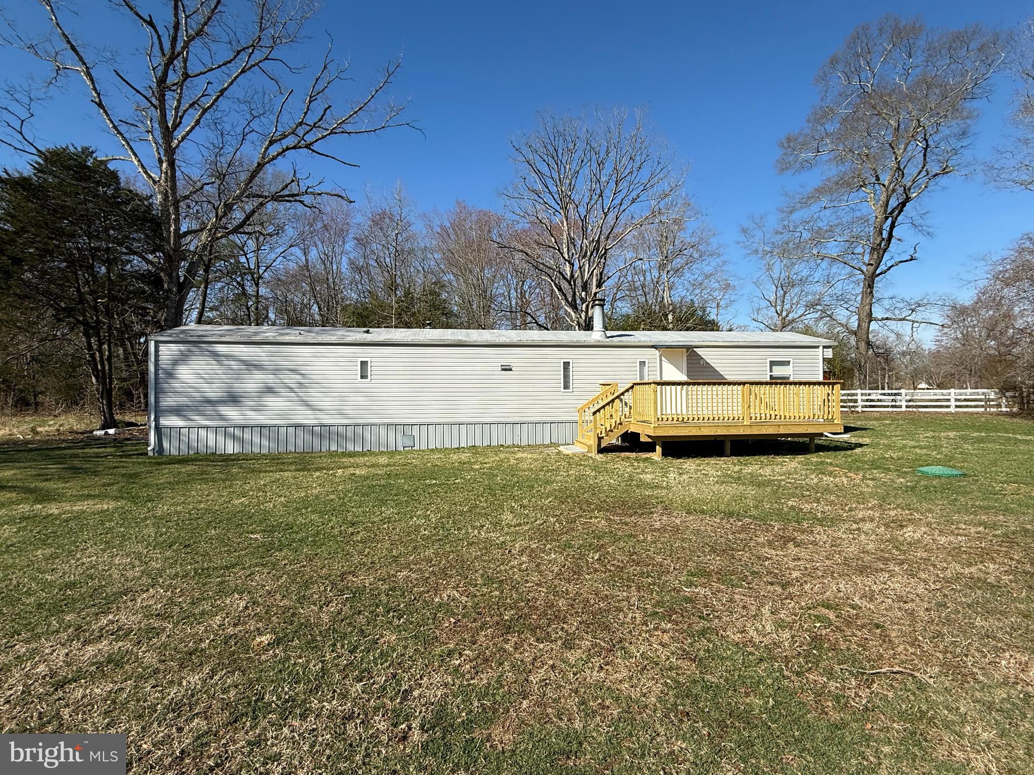 6095 Chan Place La Plata, MD 20646 - Photo 2 of 9 a view of a yard with large tree