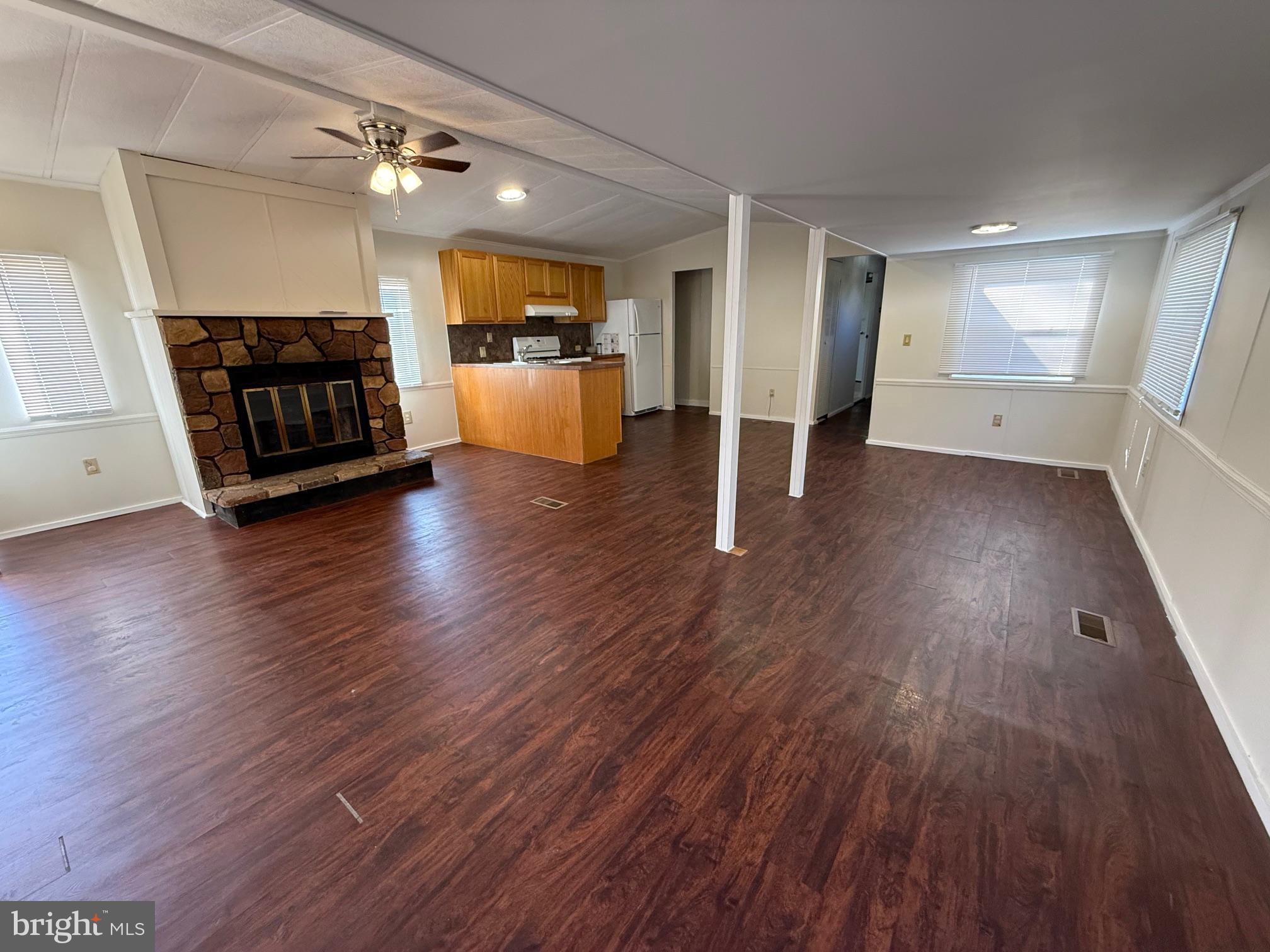 6095 Chan Place La Plata, MD 20646 - Photo 3 of 9 a view of a livingroom with furniture and a fireplace