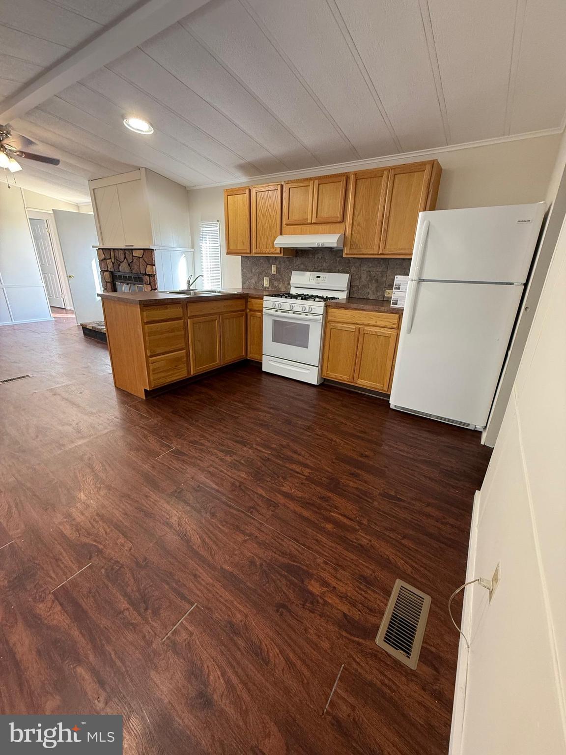 6095 Chan Place La Plata, MD 20646 - Photo 4 of 9 a view of kitchen with furniture and wooden floor