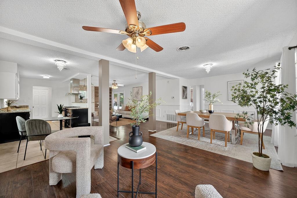 9662 Ferndale Road Dallas, TX 75238 - Photo 11 of 39 a view of a dining room with furniture and wooden floor