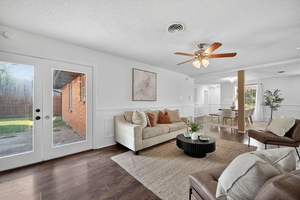 9662 Ferndale Road Dallas, TX 75238 - Photo 22 of 39 a living room with furniture wooden floor and window
