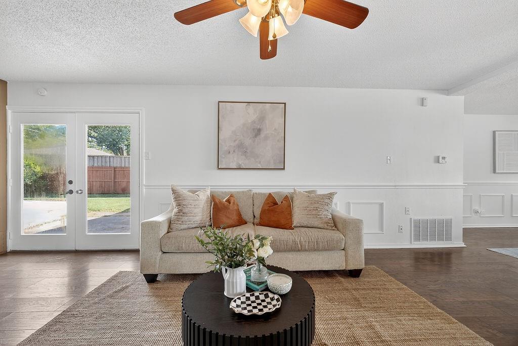 9662 Ferndale Road Dallas, TX 75238 - Photo 23 of 39 a living room with furniture and a large window