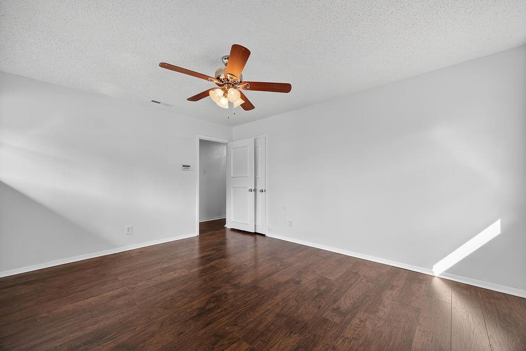 9662 Ferndale Road Dallas, TX 75238 - Photo 28 of 39 wooden floor in an empty room