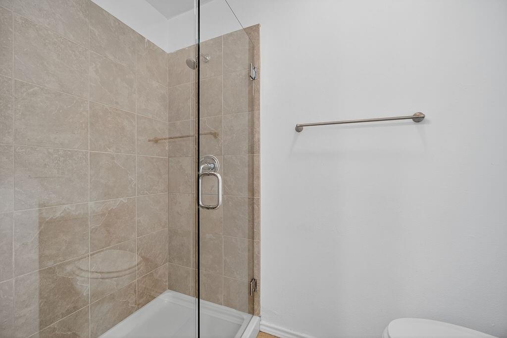 9662 Ferndale Road Dallas, TX 75238 - Photo 29 of 39 a bathroom with a shower
