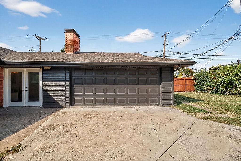 9662 Ferndale Road Dallas, TX 75238 - Photo 39 of 39 a front view of a house with garden