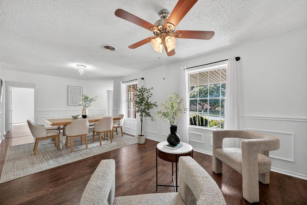 9662 Ferndale Road Dallas, TX 75238 - Photo 6 of 39 a living room with furniture and a large window