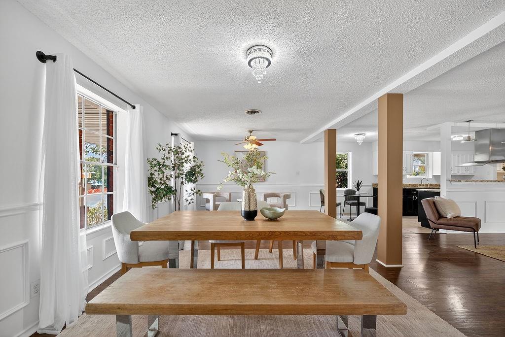 9662 Ferndale Road Dallas, TX 75238 - Photo 8 of 39 a dining room with furniture and wooden floor