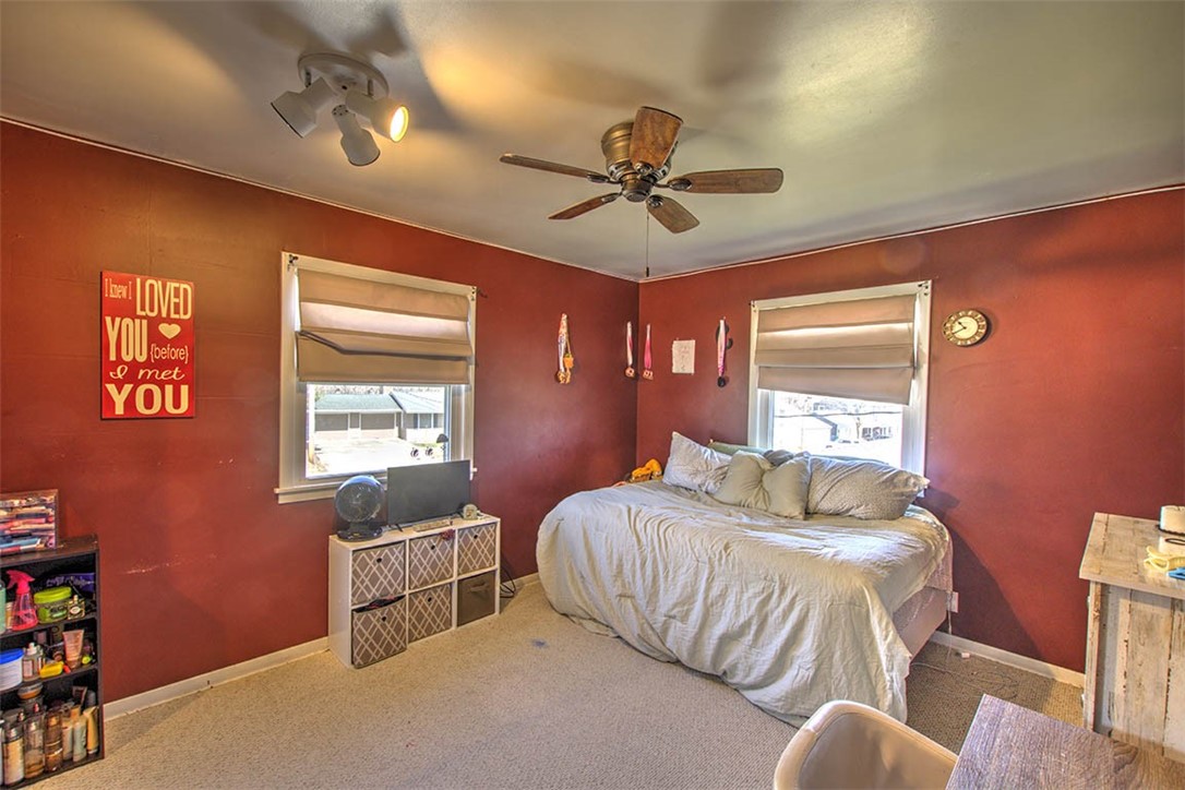 120 Point Bluff Drive Decatur, IL 62521 - Photo 14 of 34 a bedroom with a bed and a window