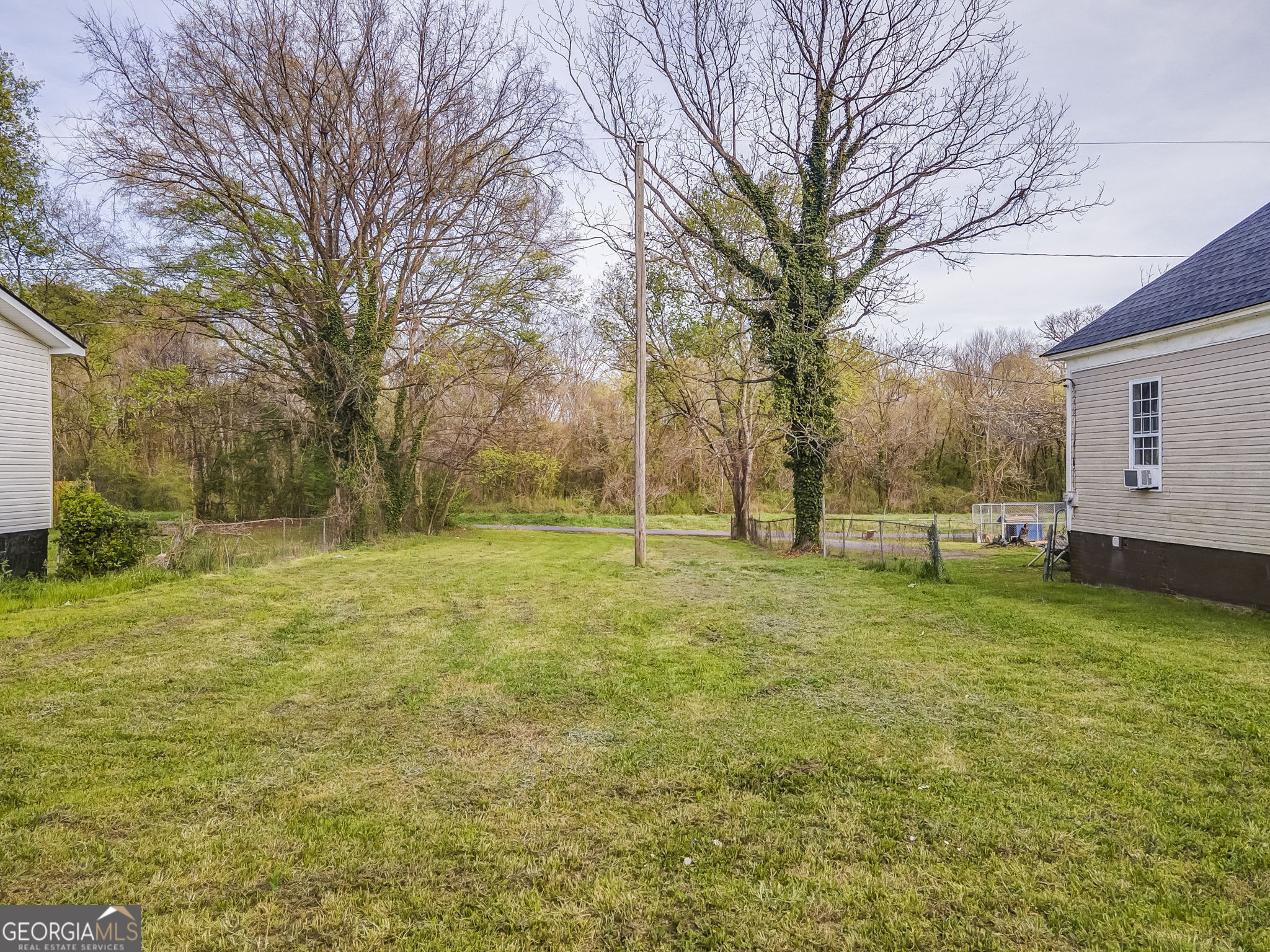319 South McLin Street Rome, GA 30161 - Photo 2 of 10 a view of a yard with a house