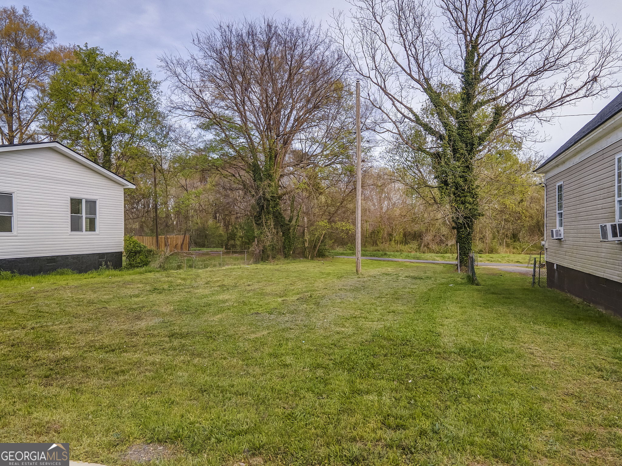 319 South McLin Street Rome, GA 30161 - Photo 4 of 10 a view of a house with a yard