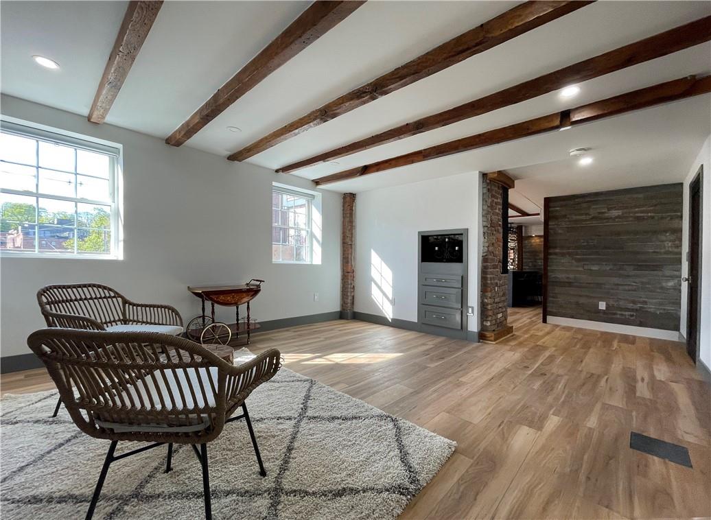 5 Leonard Street, Unit STUDIO Beacon, NY 12508 - Photo 1 of 1 a view of a livingroom with furniture and windows