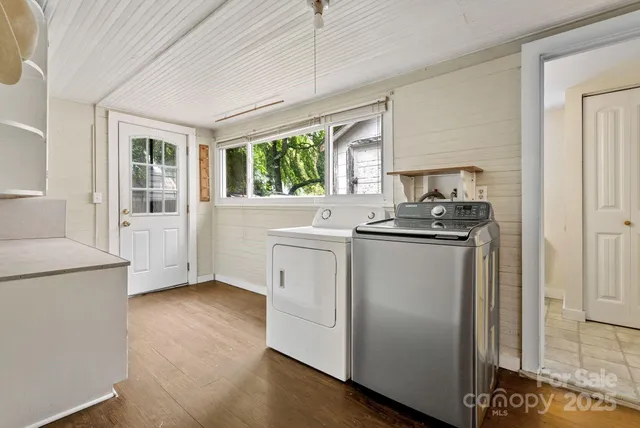 a kitchen with a refrigerator stove and sink