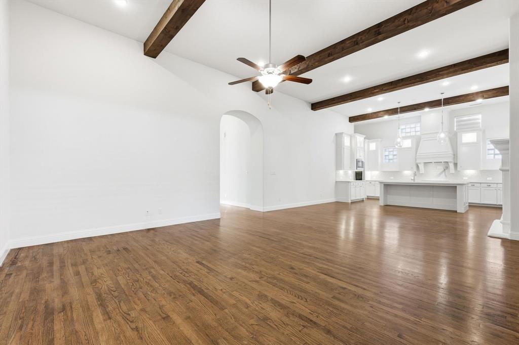 3968 Sevilla Drive Frisco, TX 75034 - Photo 15 of 38 wooden floor in an empty room with a window