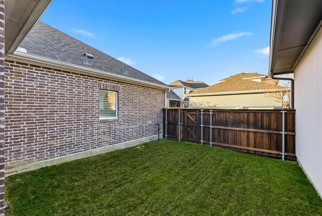 3968 Sevilla Drive Frisco, TX 75034 - Photo 29 of 38 a view of a backyard with a small cabin