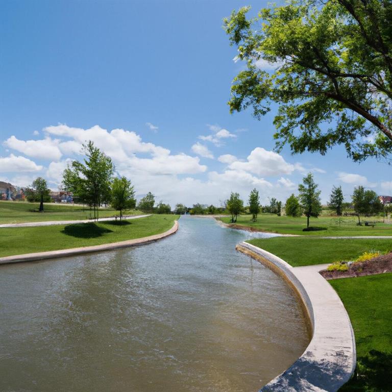 3968 Sevilla Drive Frisco, TX 75034 - Photo 37 of 38 a view of a golf course with a lake
