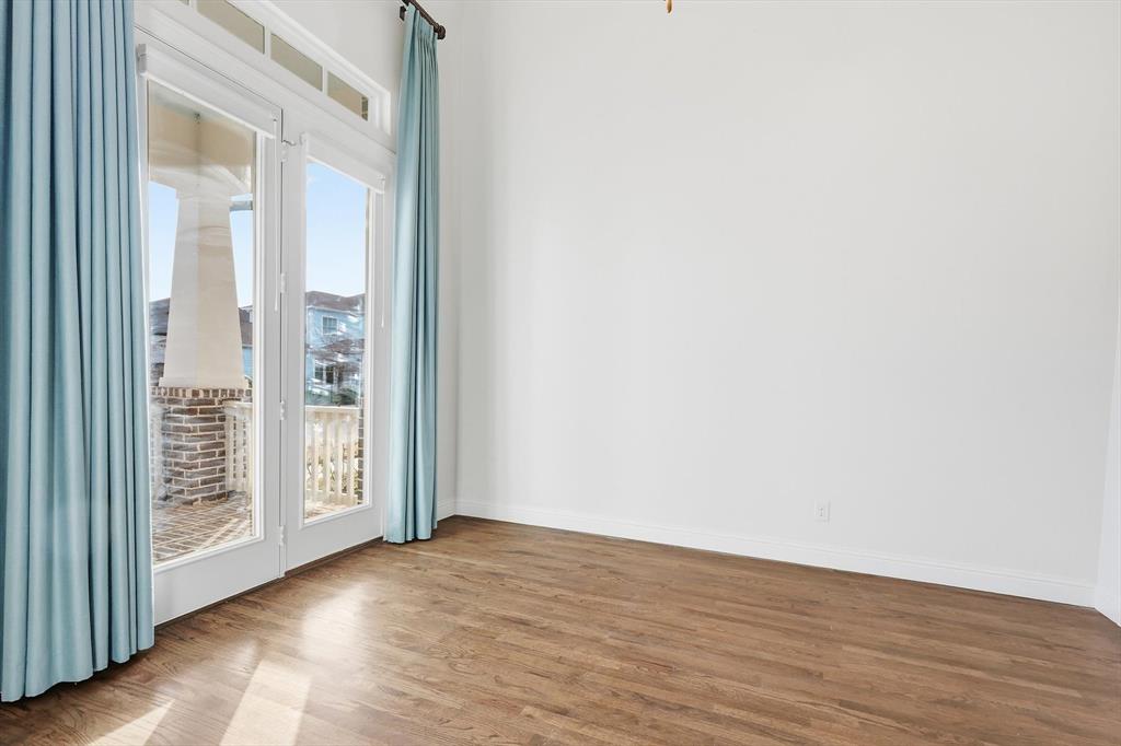 3968 Sevilla Drive Frisco, TX 75034 - Photo 4 of 38 a view of an empty room with wooden floor and a window