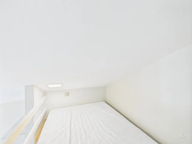 a kitchen with stainless steel appliances granite countertop a stove microwave and sink