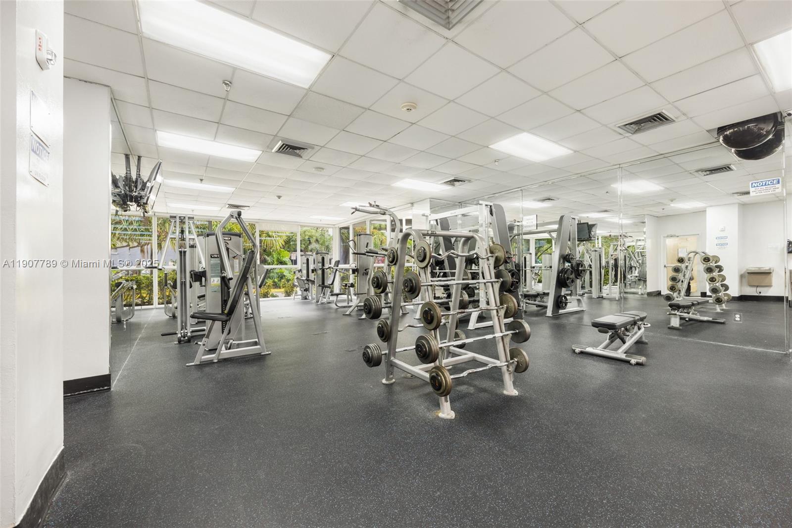 850 North Miami Avenue, Unit W906 Miami, FL 33136 - Photo 18 of 23 a view of a room with gym equipment