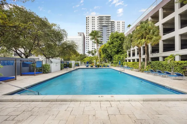 a view of outdoor space yard and swimming pool