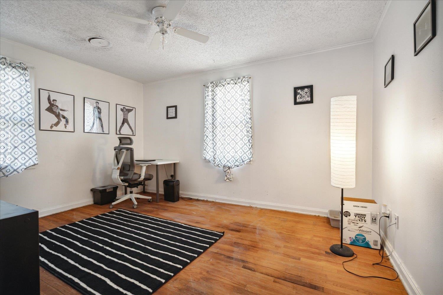 977 Waring Road Memphis, TN 38122 - Photo 21 of 32 Office area featuring hardwood / wood-style floors, a textured ceiling, and ceiling fan