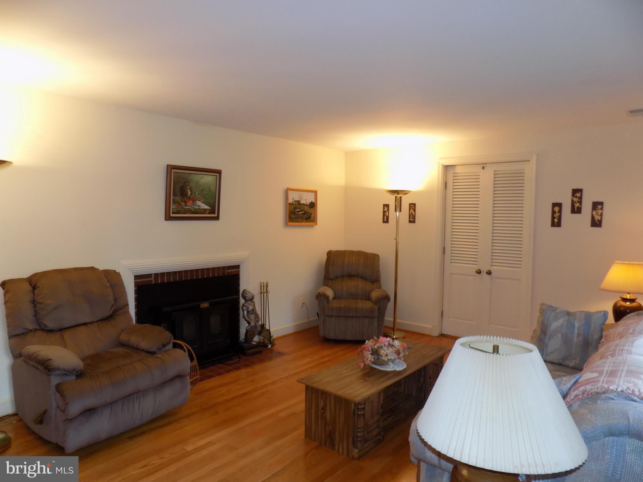 Formal Living room with brick fireplace