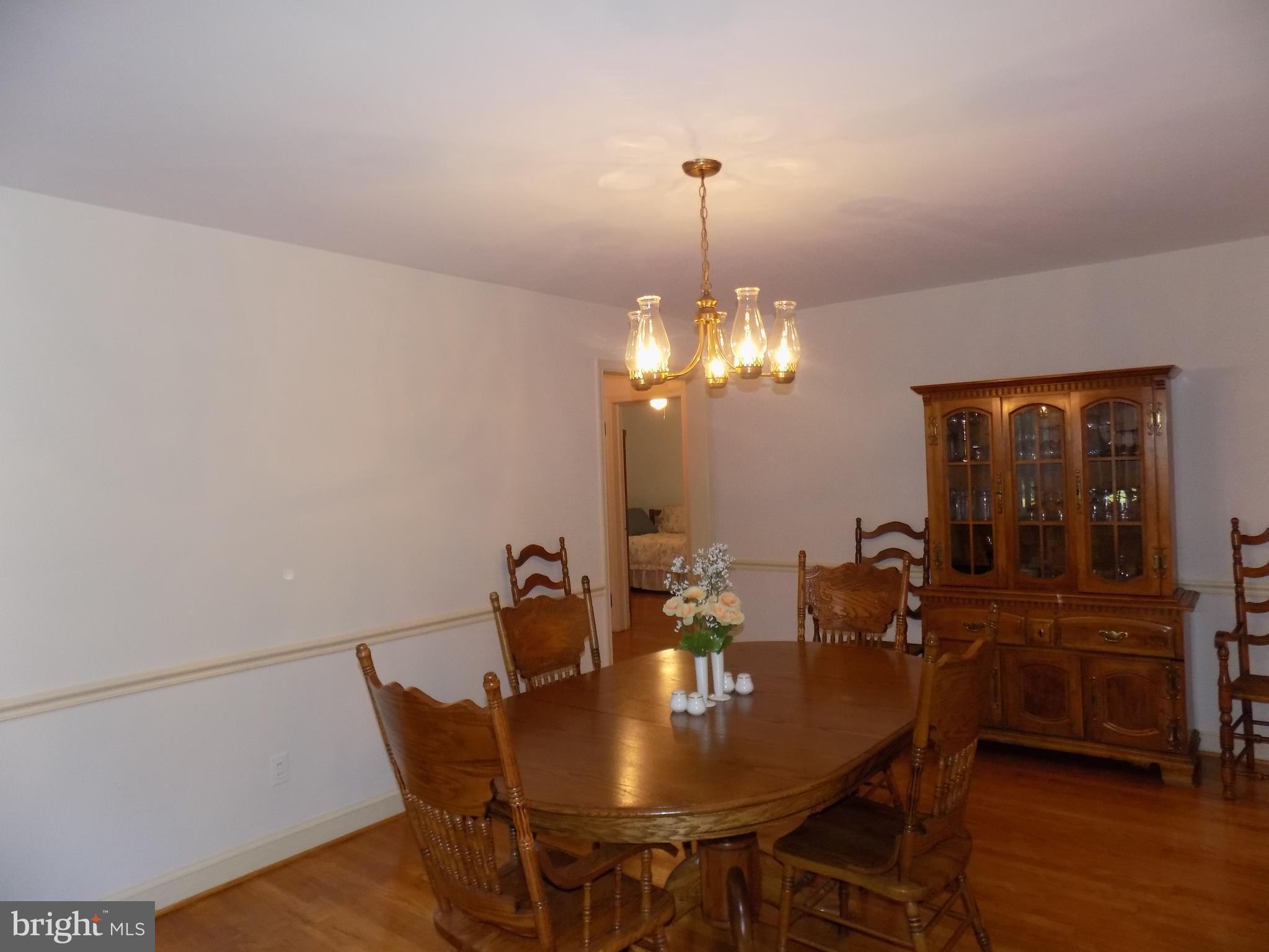 9603 Atom Road Clinton, MD 20735 - Photo 20 of 30 Dining Room with several windows for natural light