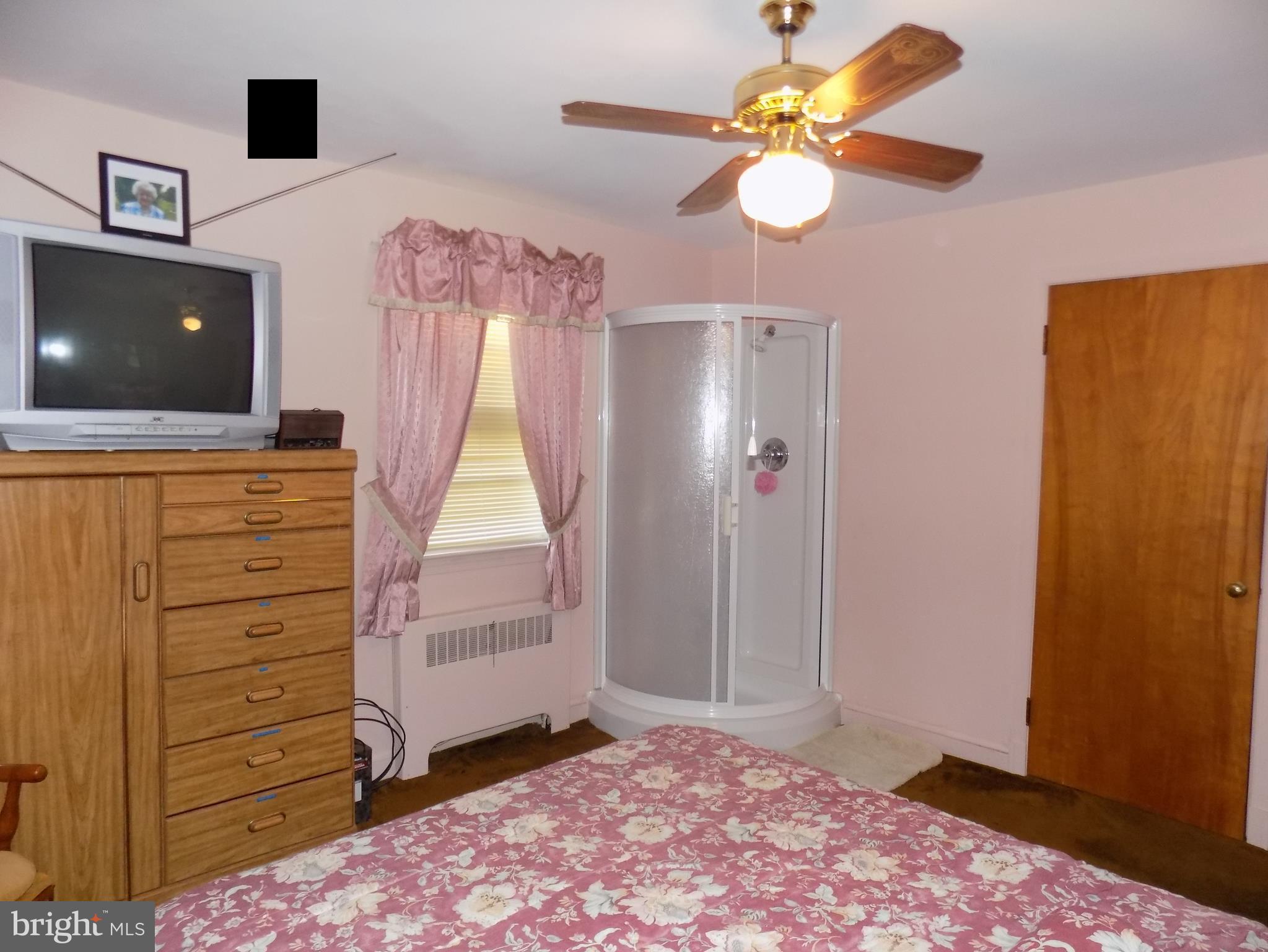 9603 Atom Road Clinton, MD 20735 - Photo 23 of 30 Master w/Ceiling Fan-Hardwood Floors under carpet
