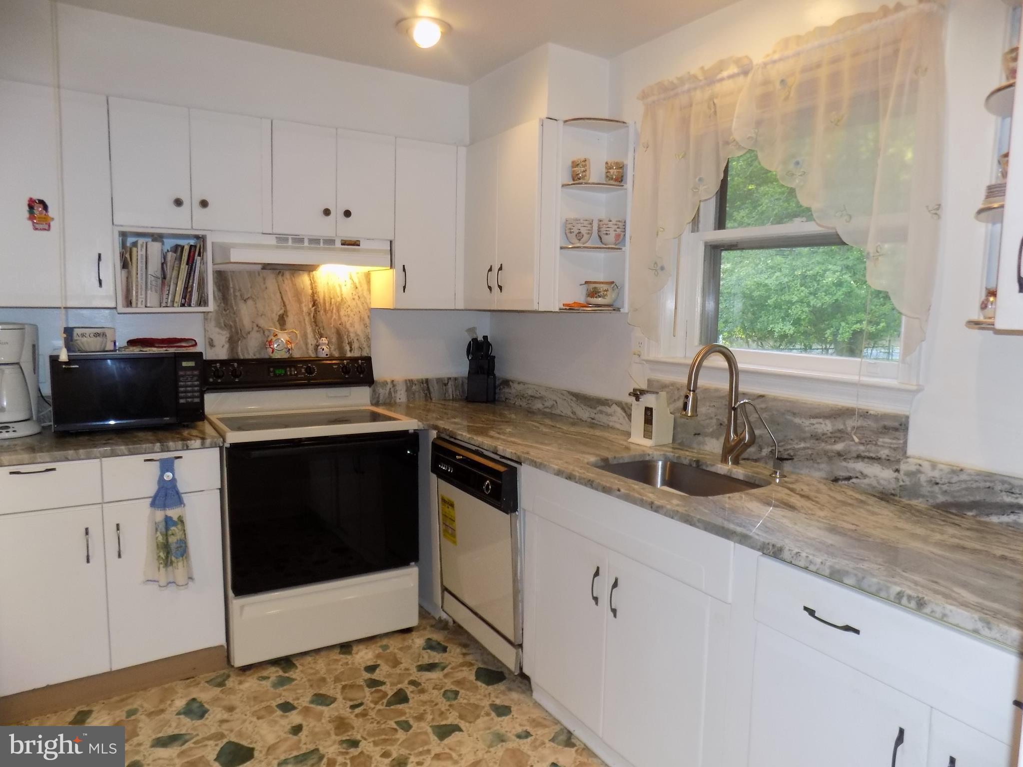 Kitchen with granite countertops