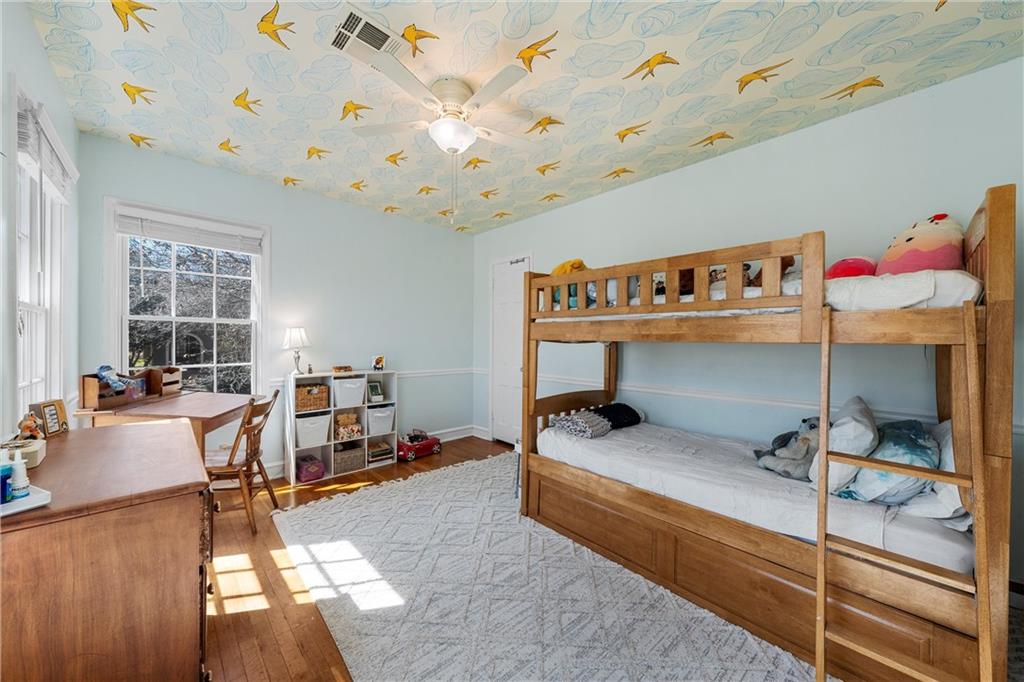 2737 Cumberland Avenue Waco, TX 76708 - Photo 37 of 45 a bedroom with furniture and a chandelier