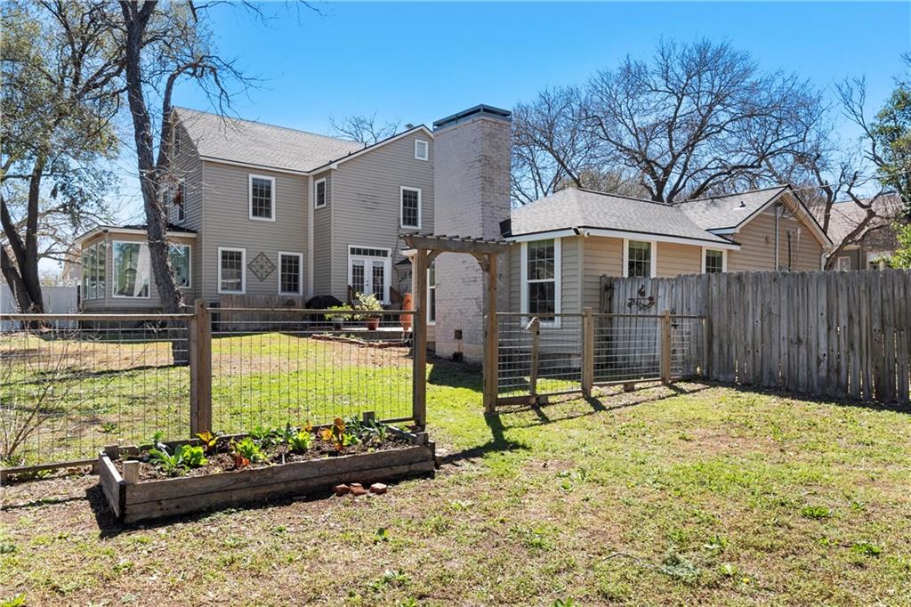 2737 Cumberland Avenue Waco, TX 76708 - Photo 44 of 45 a view of a house with a yard covered in snow
