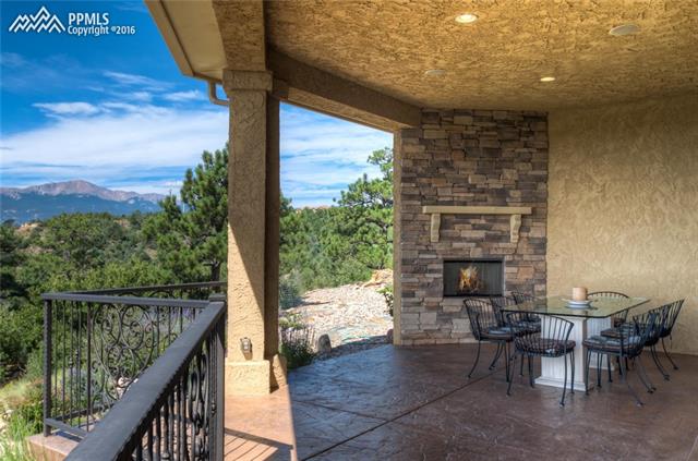 4516 Seton Hall Road Colorado Springs, CO 80918 - Photo 30 of 36 Pike's Peak view and al fresco dining by the fire.